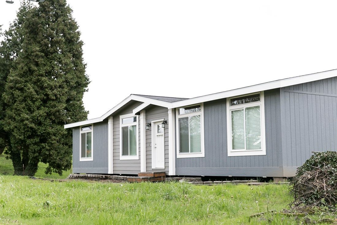 The 2023 COLUMBIA RIVER Exterior. This Manufactured Mobile Home features 3 bedrooms and 2 baths.