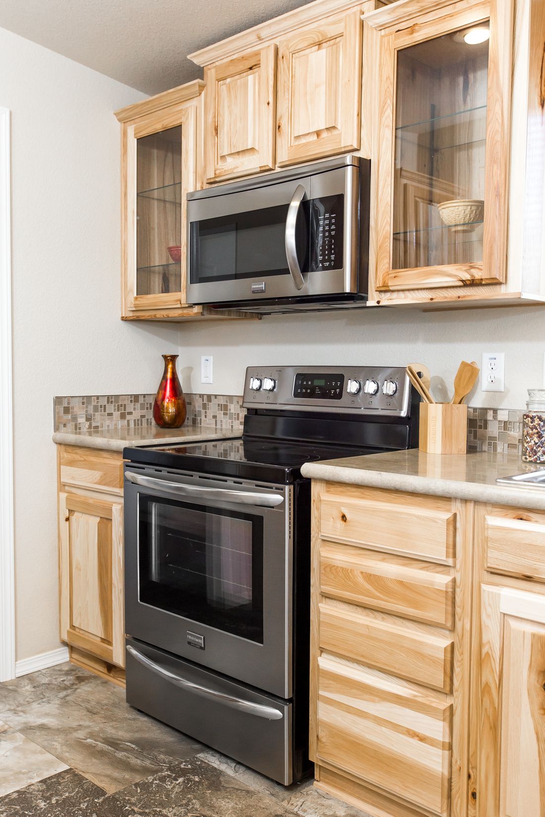 The 9590S BLACKMORE Kitchen. This Manufactured Mobile Home features 3 bedrooms and 2 baths.