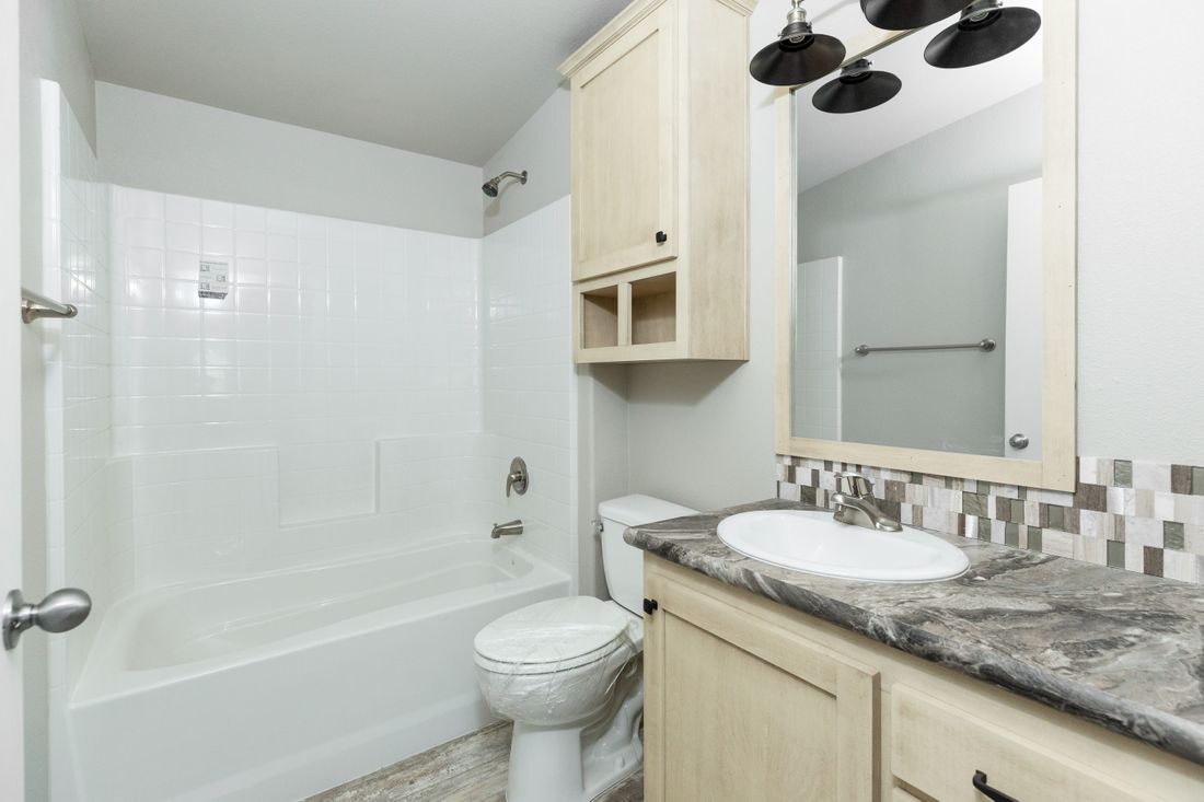 The 2860 MARLETTE SPECIAL Guest Bathroom. This Manufactured Mobile Home features 3 bedrooms and 2 baths.