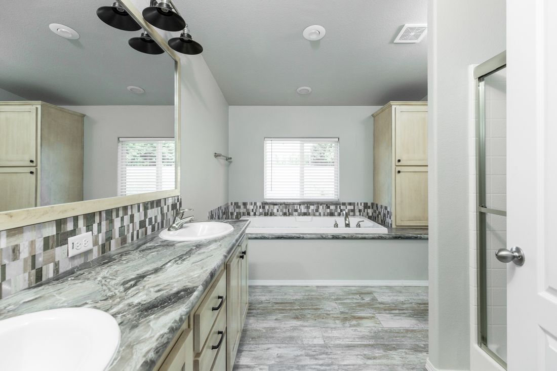 The 2860 MARLETTE SPECIAL Master Bathroom. This Manufactured Mobile Home features 3 bedrooms and 2 baths.
