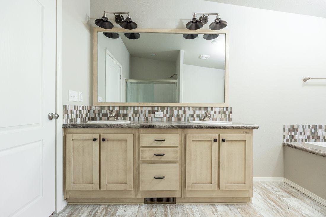 The 2860 MARLETTE SPECIAL Master Bathroom. This Manufactured Mobile Home features 3 bedrooms and 2 baths.