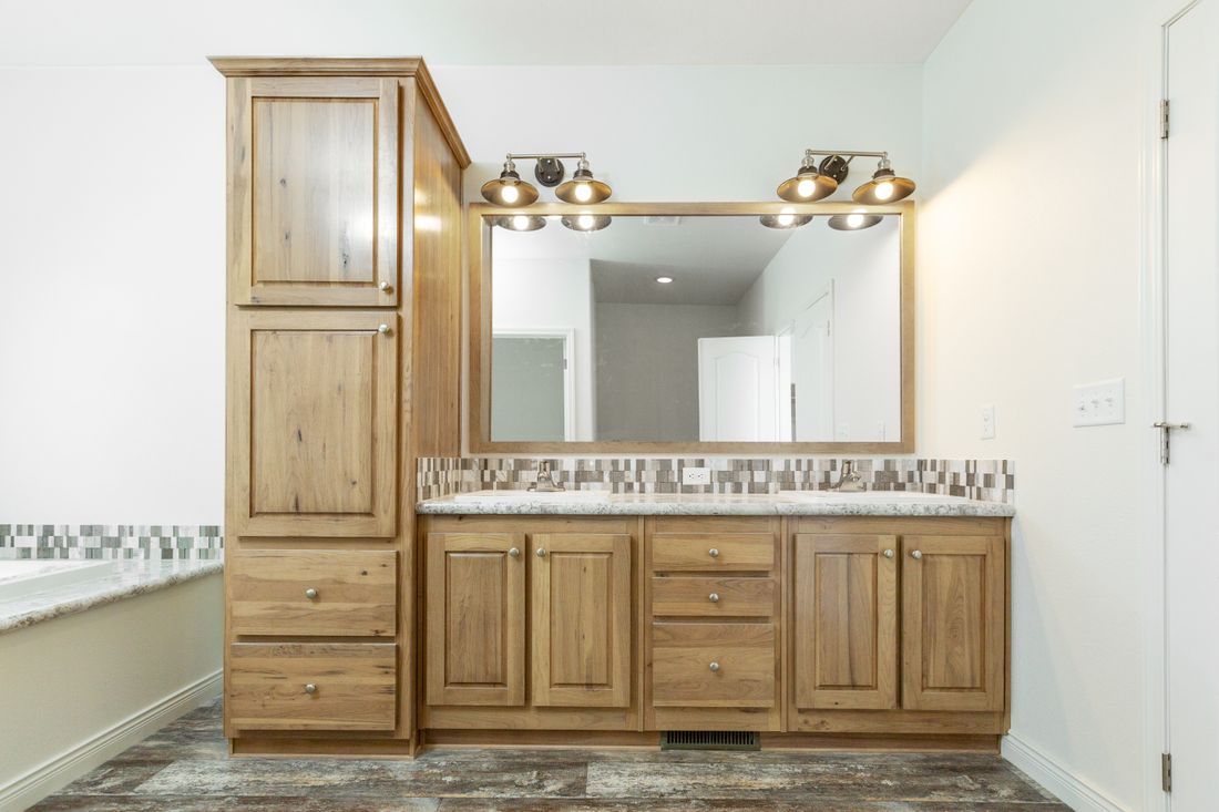 The 9585S MCKINLEY Master Bathroom. This Manufactured Mobile Home features 3 bedrooms and 2 baths.