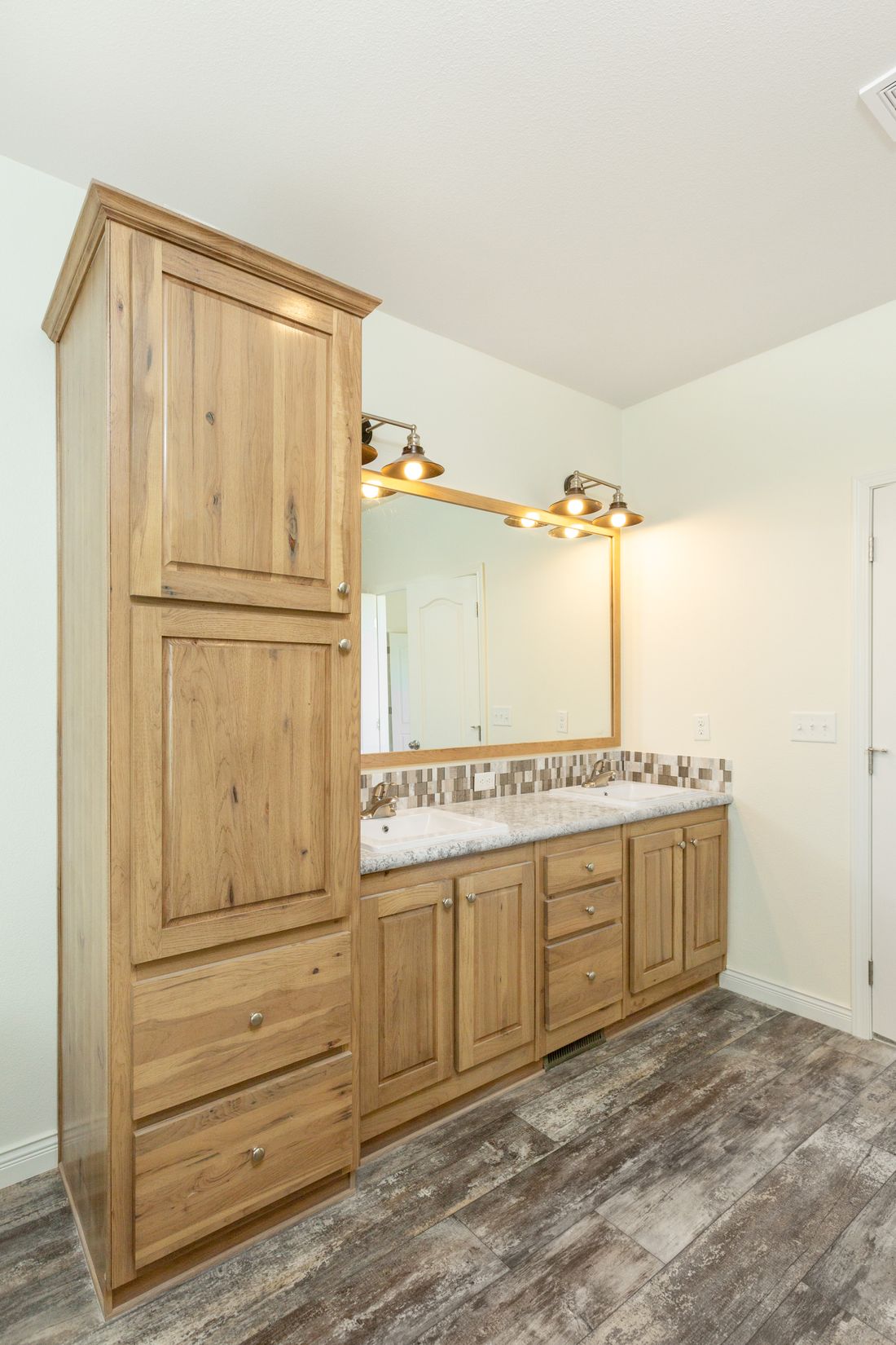 The 9585S MCKINLEY Master Bathroom. This Manufactured Mobile Home features 3 bedrooms and 2 baths.