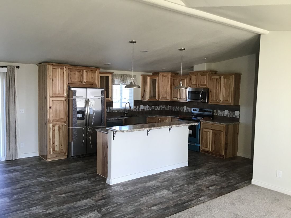 The 9596S RAINIER Kitchen. This Manufactured Mobile Home features 3 bedrooms and 2 baths.