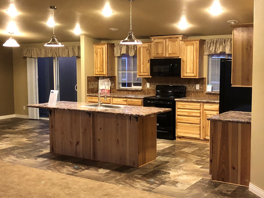 The 9588S THE SAINT HELENS Kitchen. This Manufactured Mobile Home features 3 bedrooms and 2 baths.