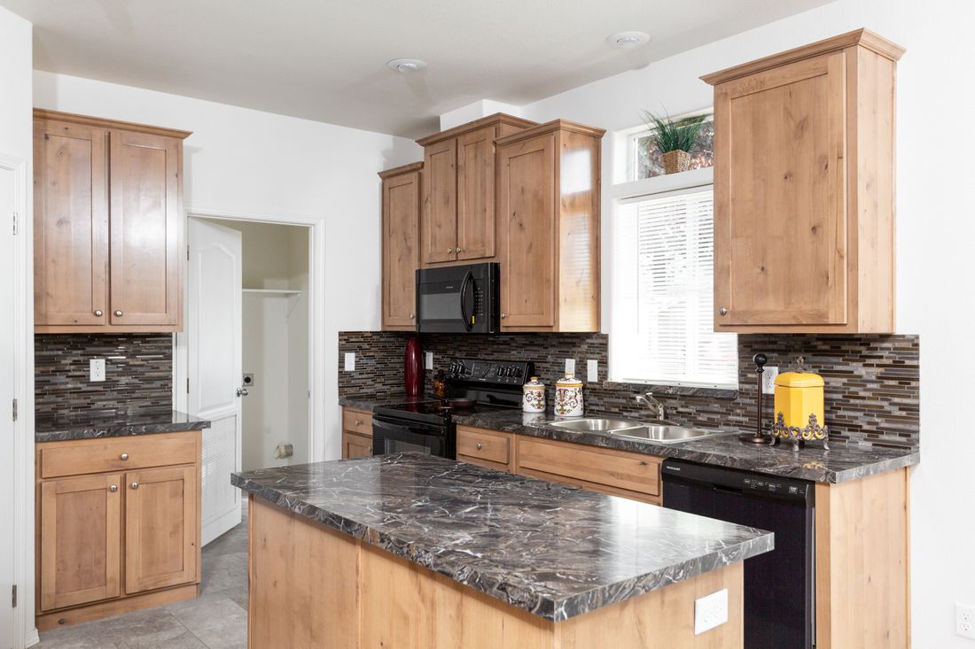 The 2868 A SUMMIT Kitchen. This Manufactured Mobile Home features 4 bedrooms and 2 baths.