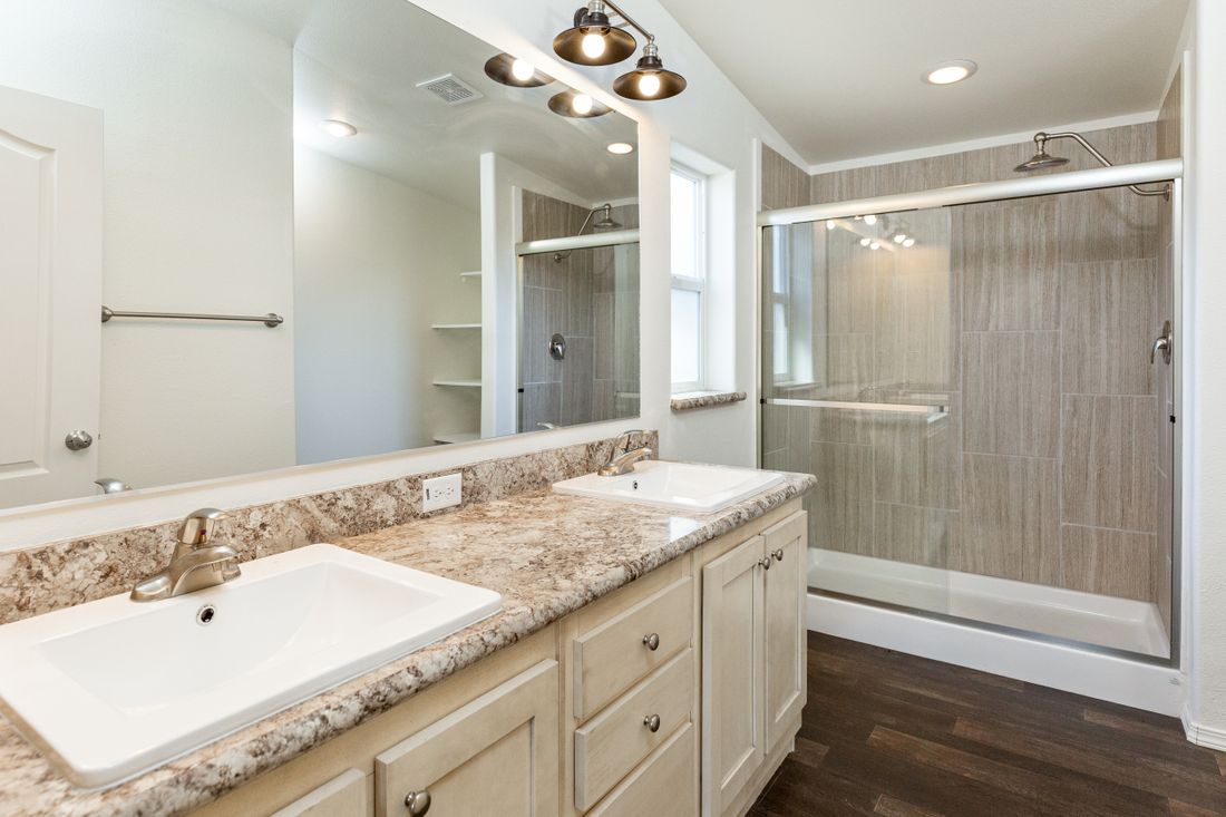 The 2848C CANYON Primary Bathroom. This Manufactured Mobile Home features 3 bedrooms and 2 baths.
